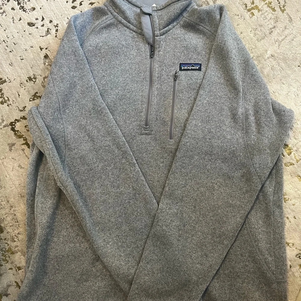 A grey Patagonia sweater with zipper and chest pocket. Comfy and warm. Large. - Picture 2 of 4